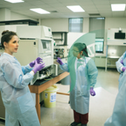 Photo of people in a lab setting.